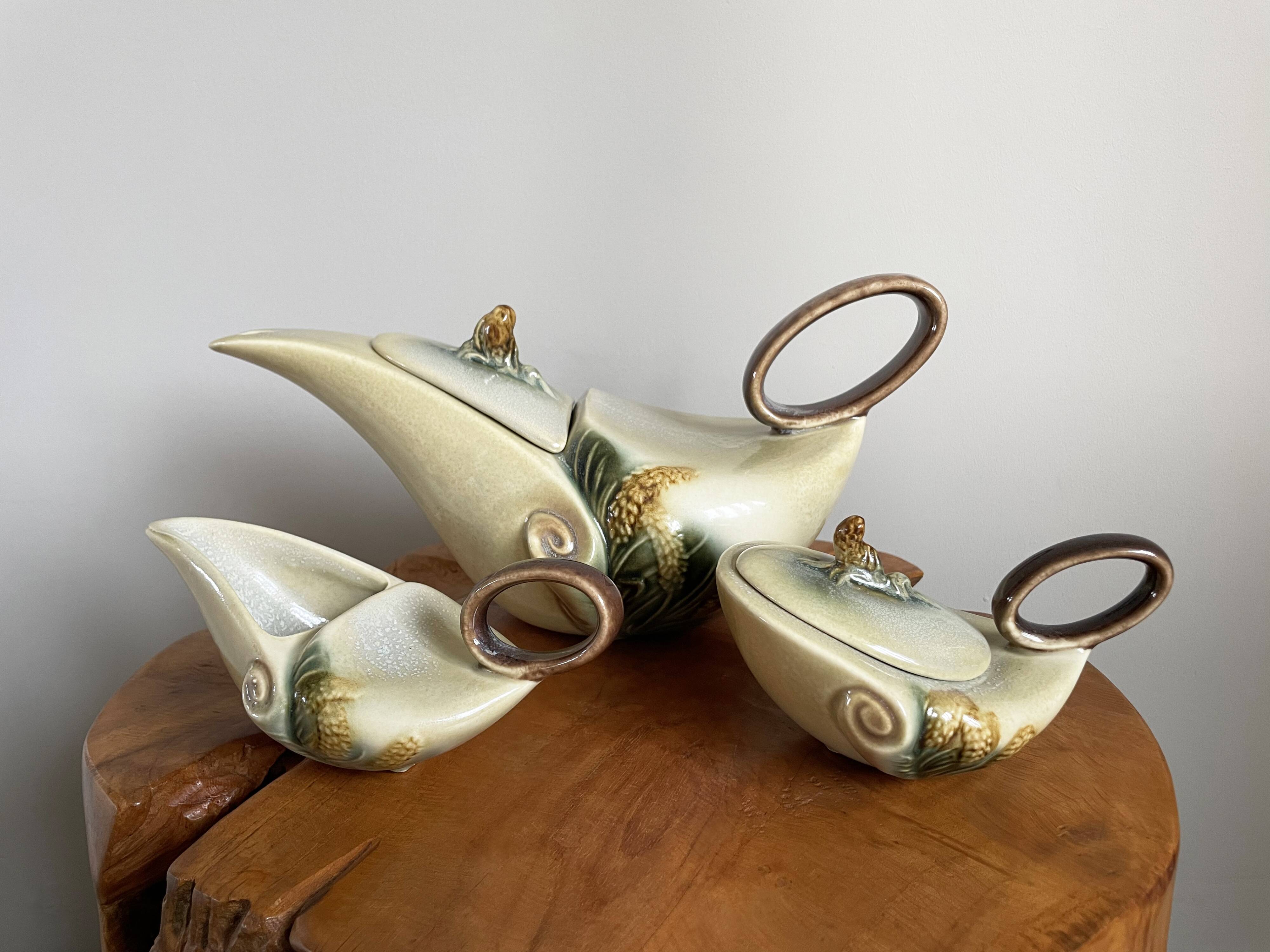 Hull pottery tea set parchment and pine, tea pot, creamer & sugar pot, american embossed majolica
