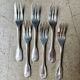6 dessert forks, Christofle pie in silver-plated metal, shell decoration.
