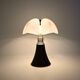 Black "Pipistrello" table lamp by Gae Aulenti for Martinelli.