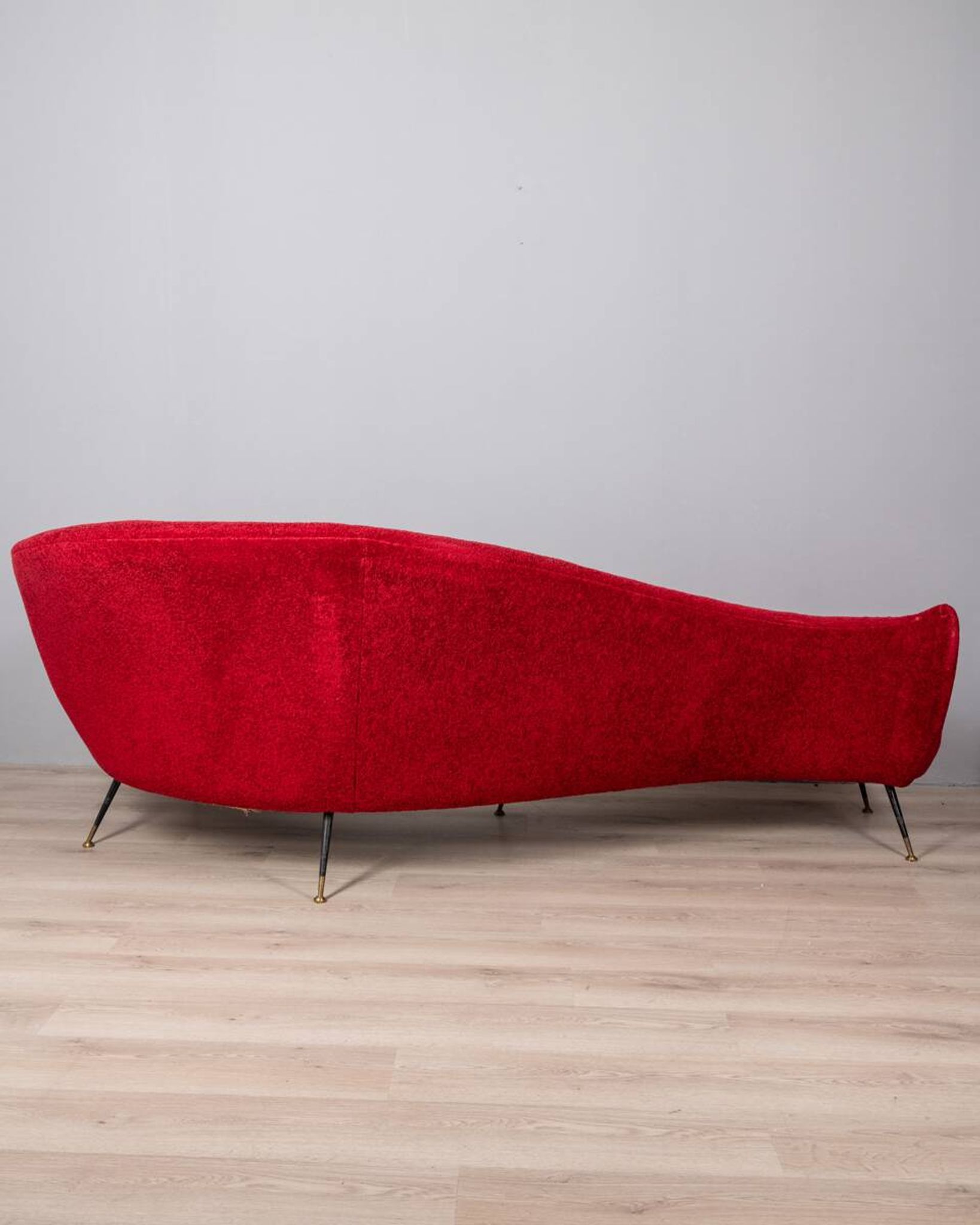 Large 1950s vintage curved sofa in red velvet italian design