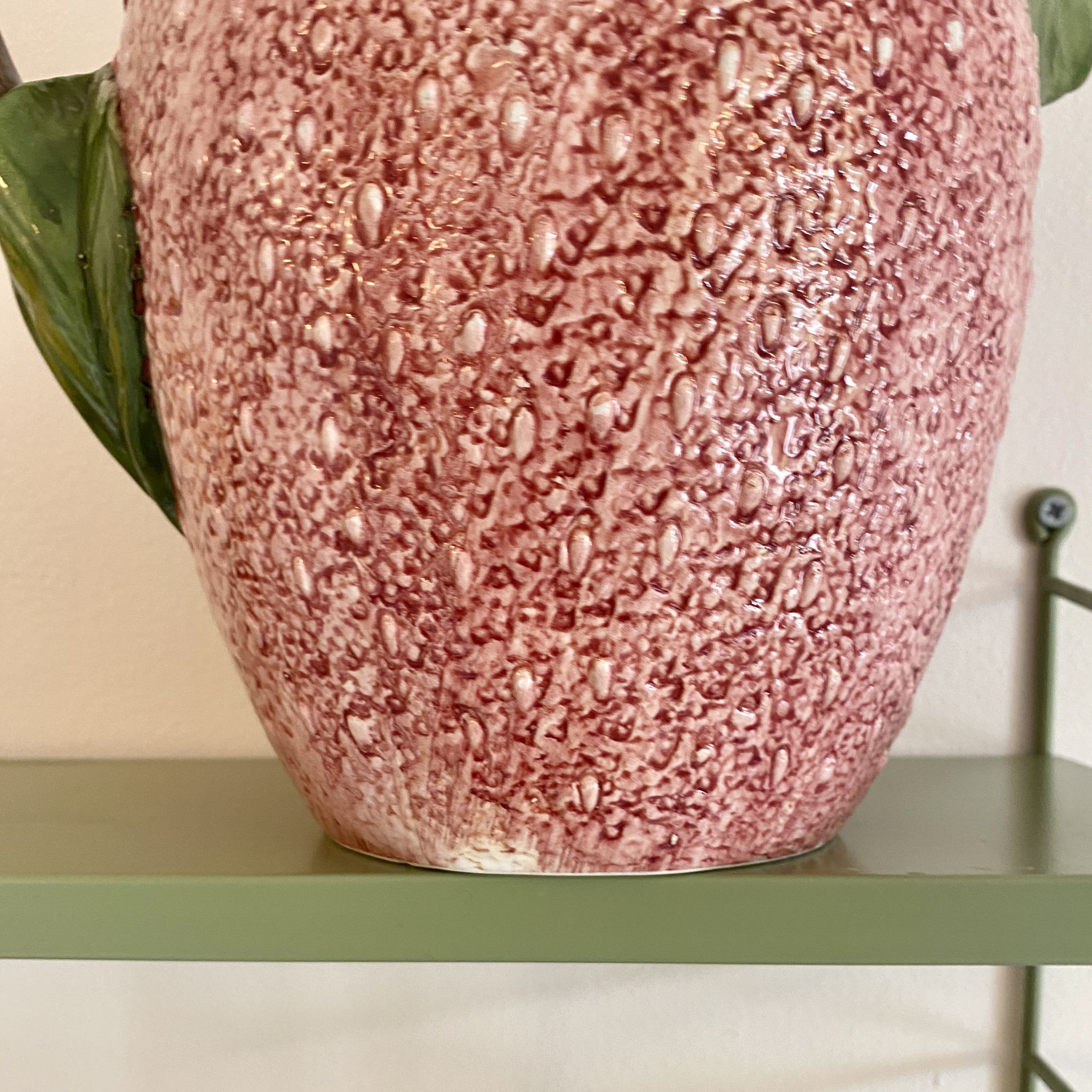 Set of ceramic fruits, a strawberry decanter and two lemon and pineapple jam jars