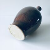 Enamelled sandstone vase