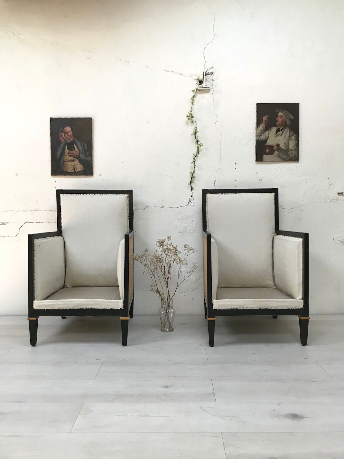 Pair of blackened wooden armchairs