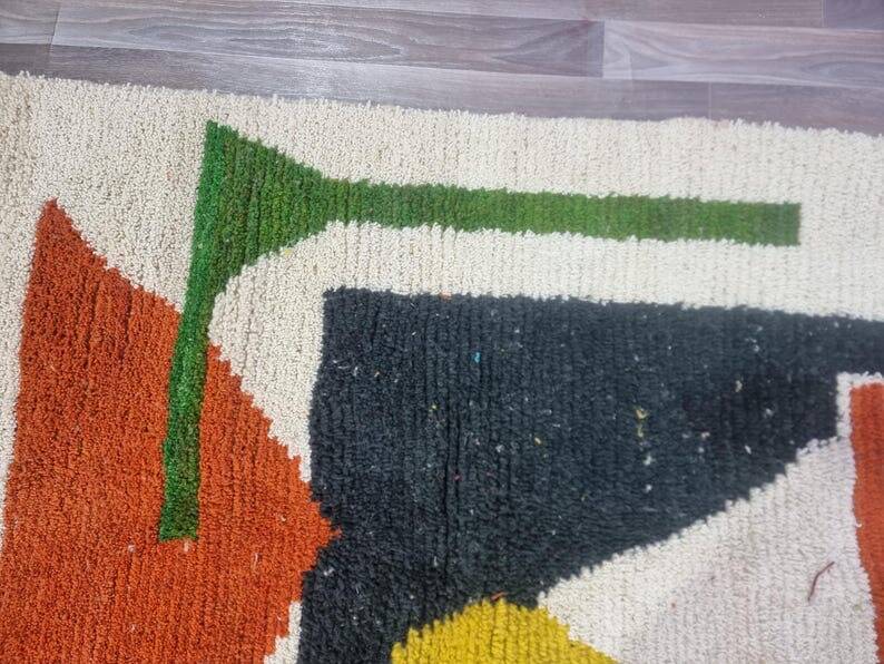 Handmade traditional Moroccan rug with colourful patterns, size 140x260 cm.