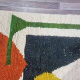 Handmade traditional Moroccan rug with colourful patterns, size 140x260 cm.
