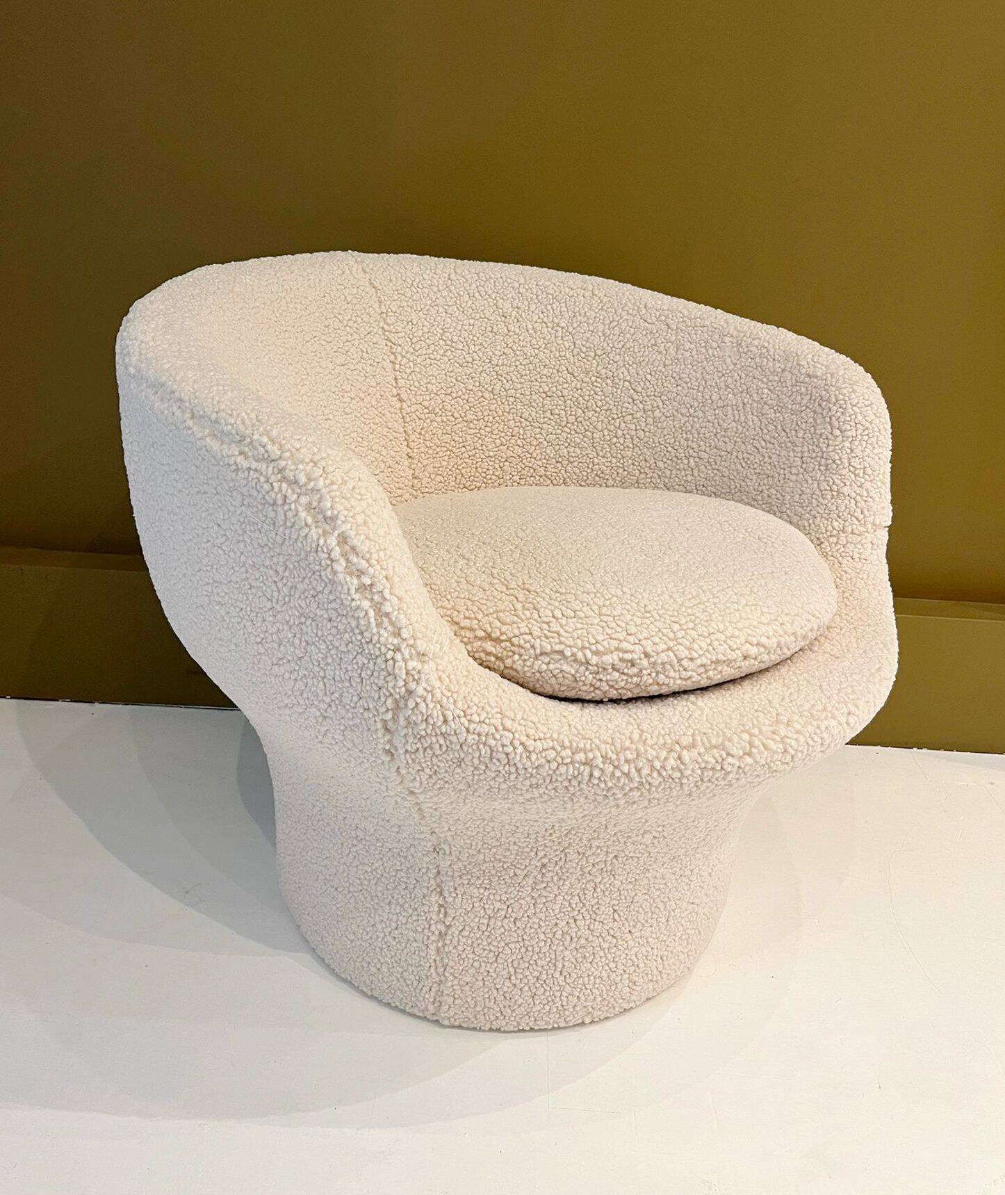 Round armchair in the style of Paulin