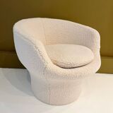 Round armchair in the style of Paulin