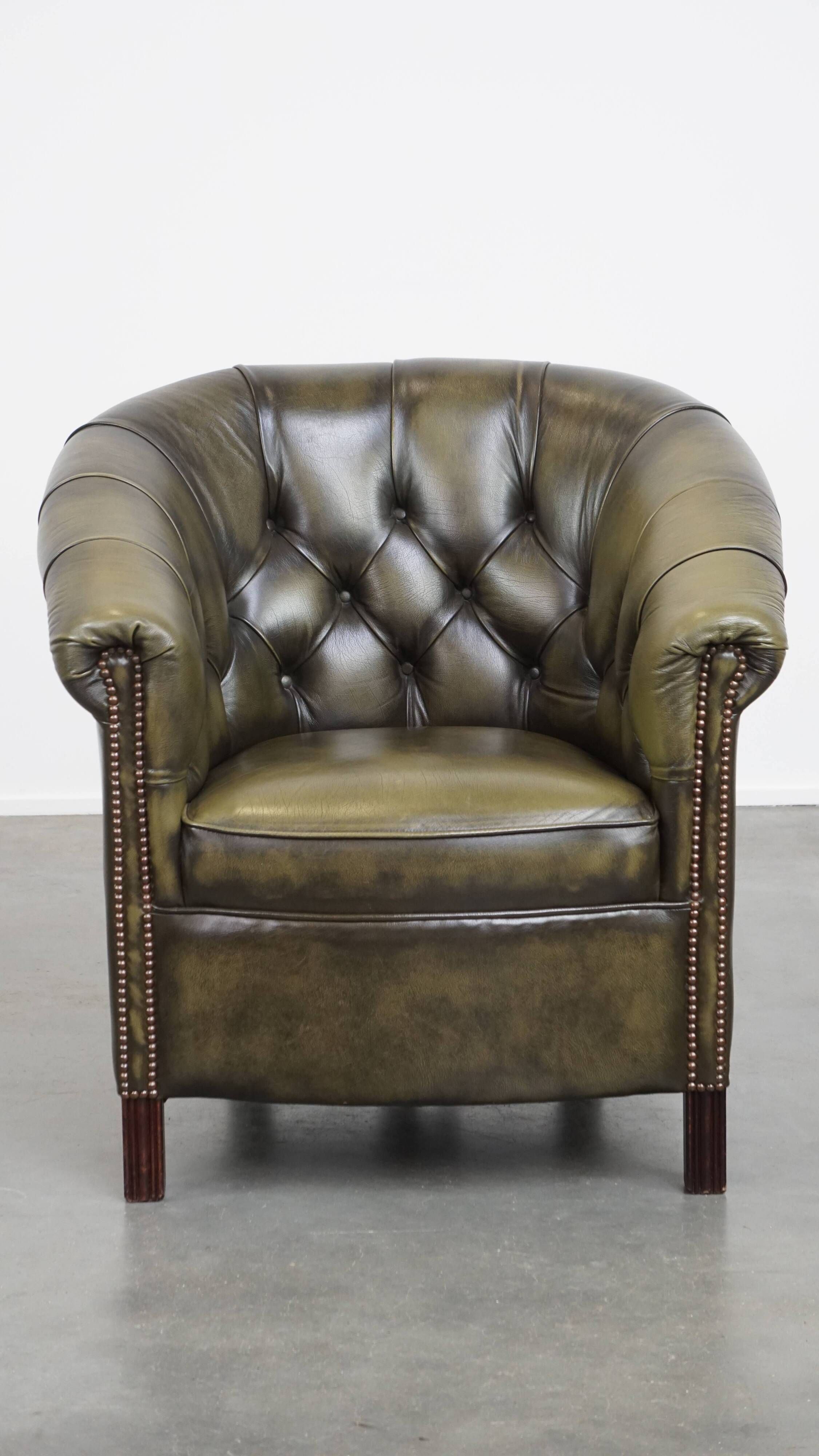 English Chesterfield club chair in olive green cowhide leather