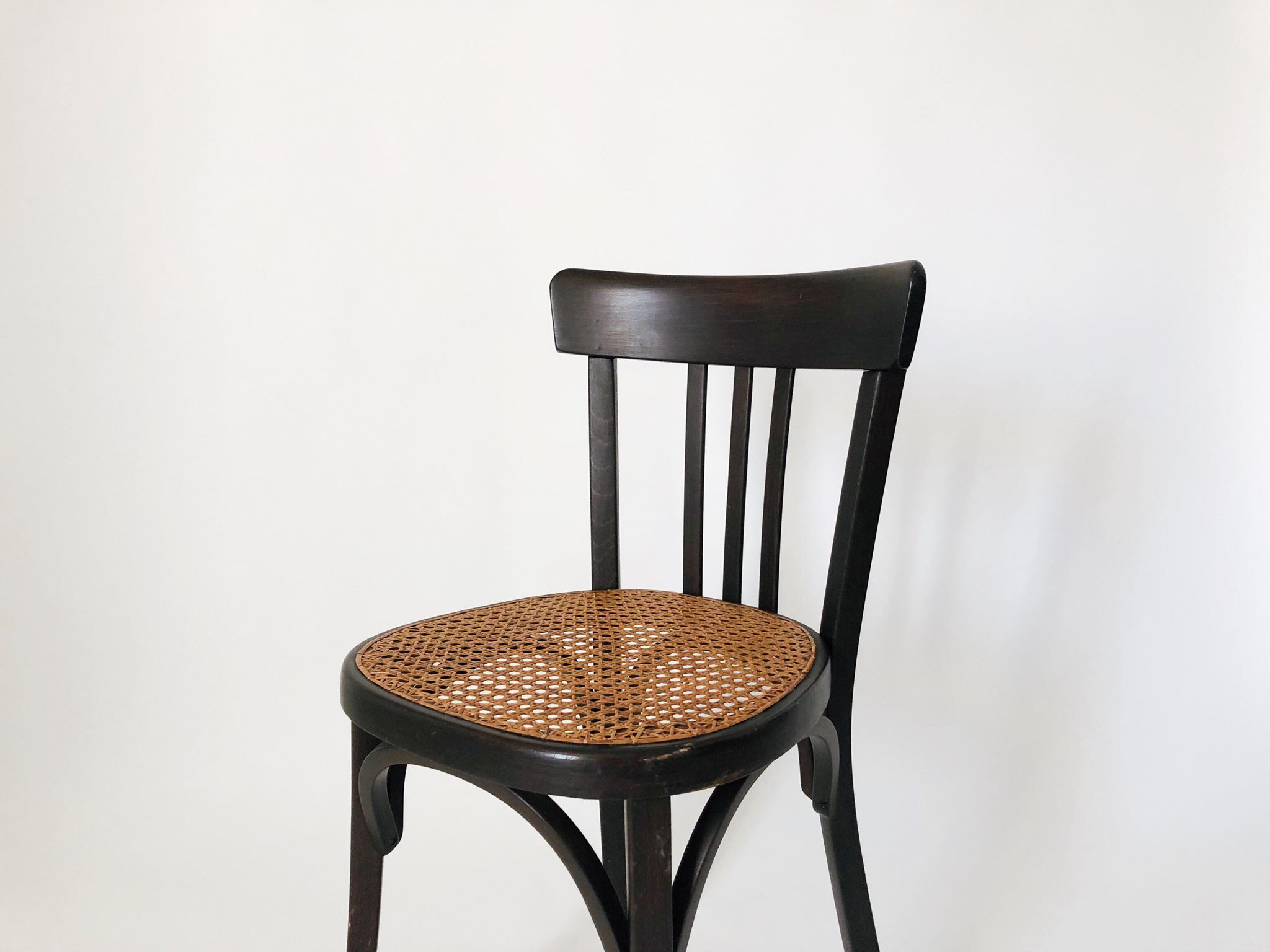 Chaise bistro cannage signée Baumann