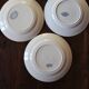 A set of 4 flat plates Terre de fer mismatched blue