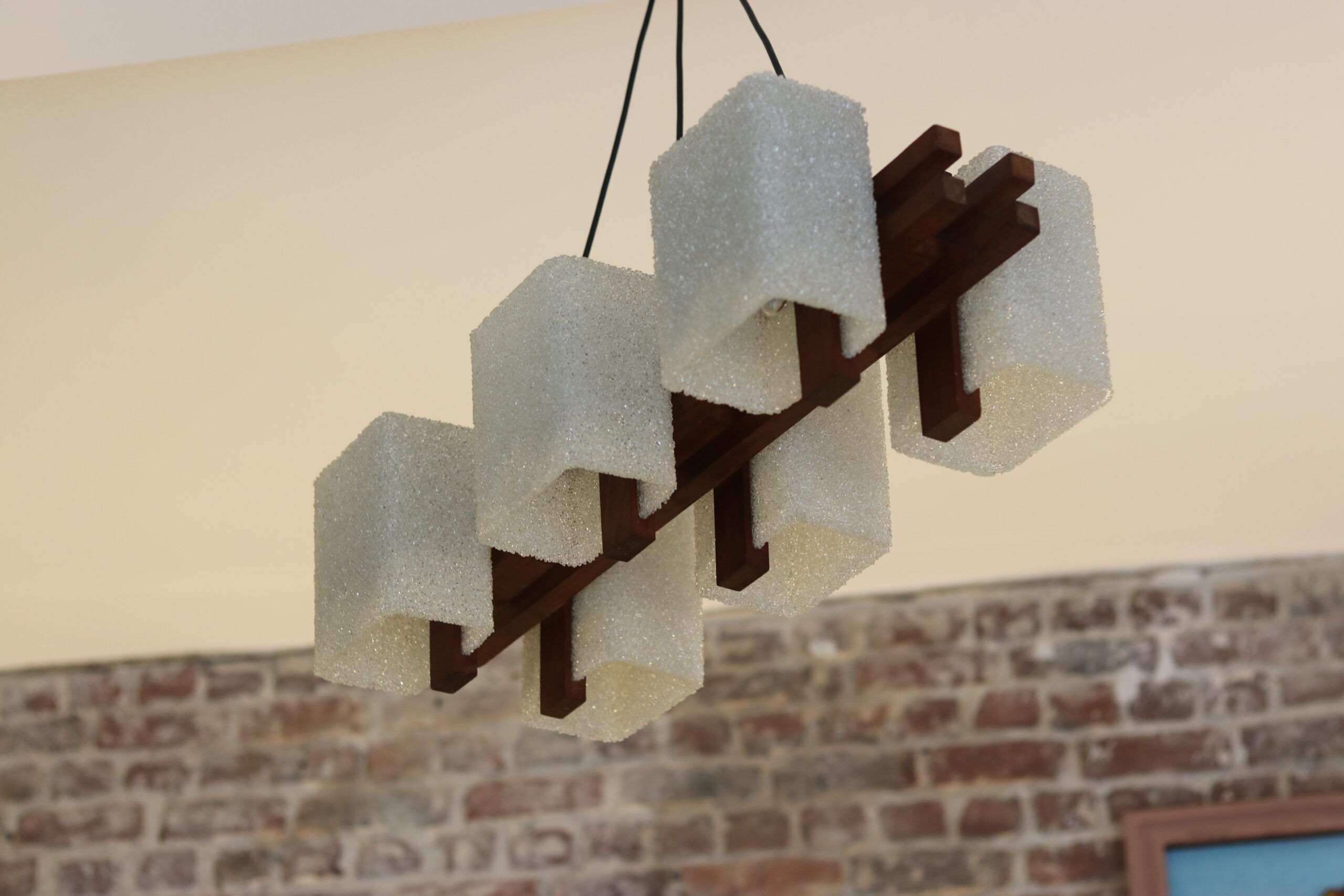 1960s Scandinavian suspension light in teak and perspex.