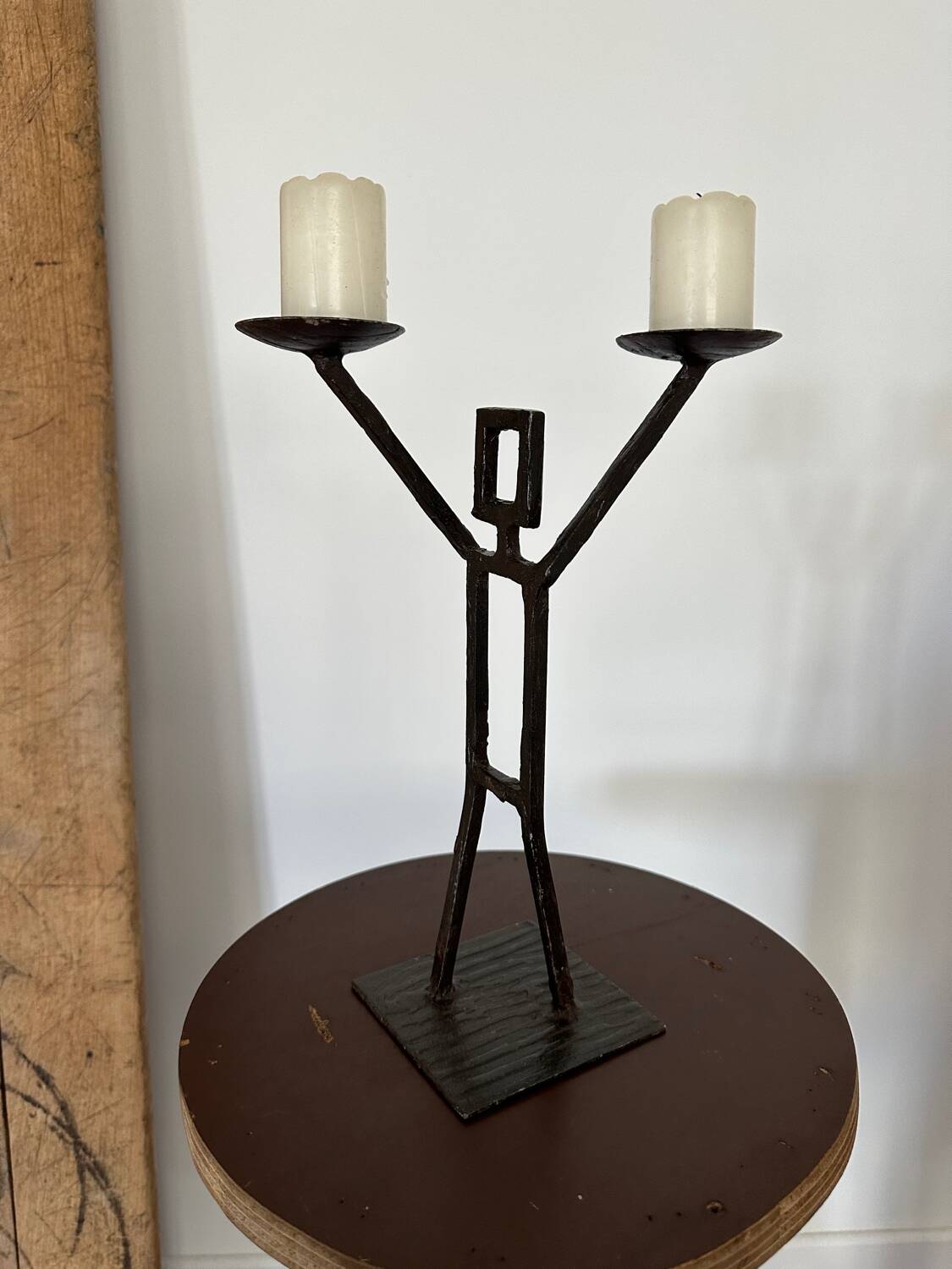 Vintage wrought iron anthropomorphic candle holder