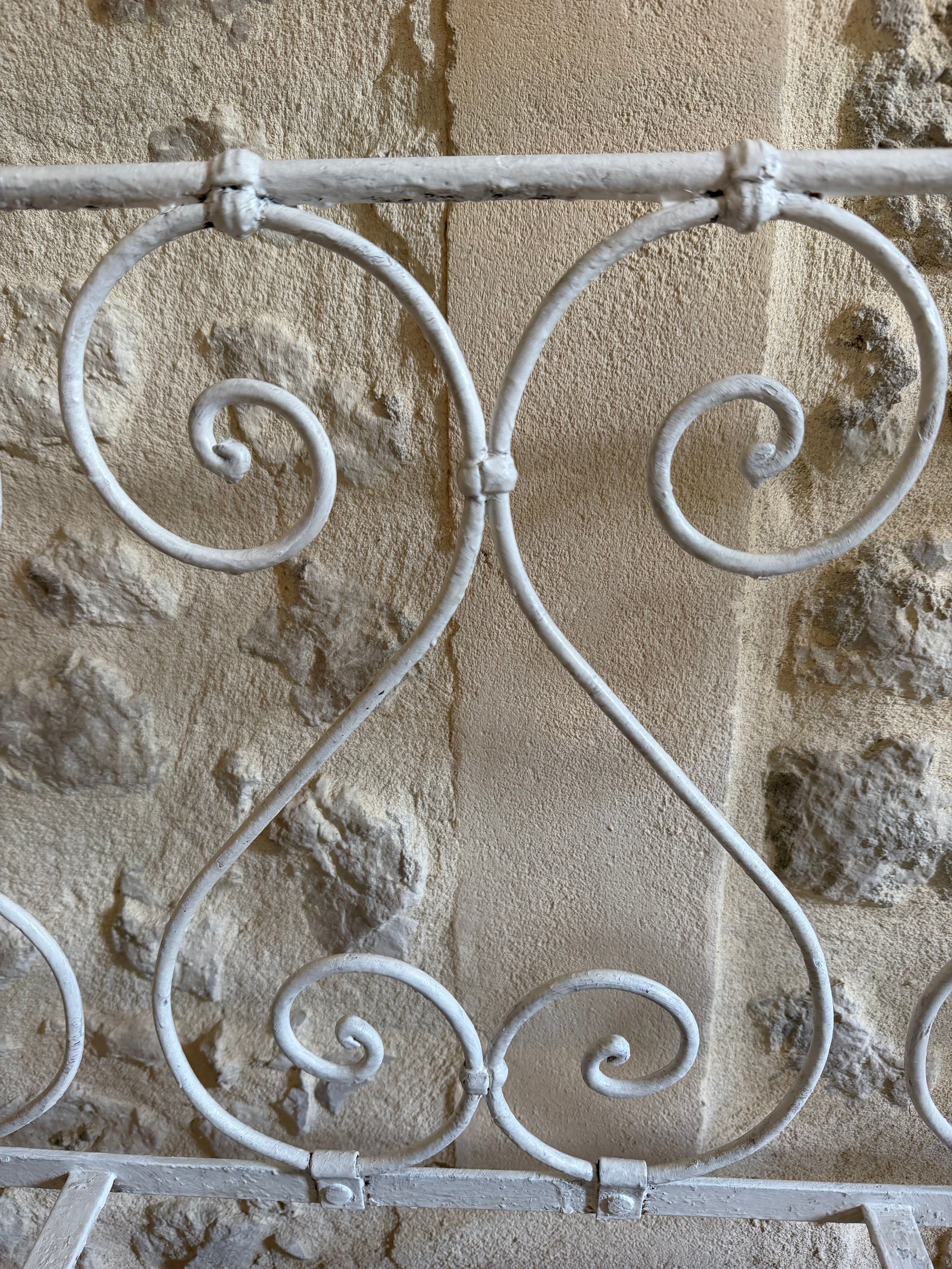 Small renovated wrought iron bed