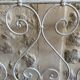 Small renovated wrought iron bed