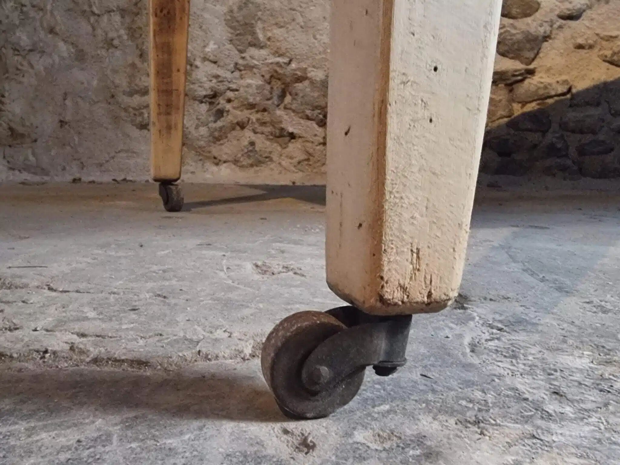 Antique French pine dining table, large farmhouse table on wheels, 19th century.