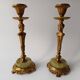 Pair of neoclassical candle holders in gilded bronze and green onyx, bust of