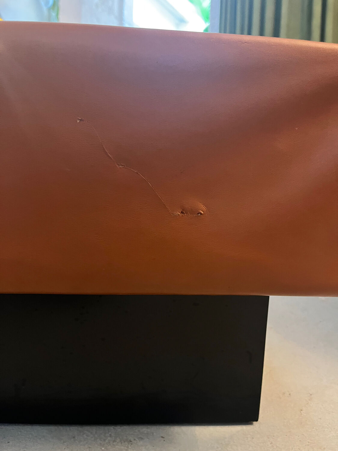 Caramel leather and black glass coffee table