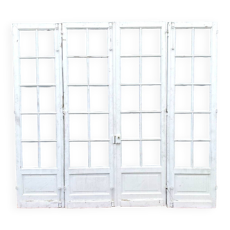Suite de quatre portes de passage a petits carreaux XX siècle