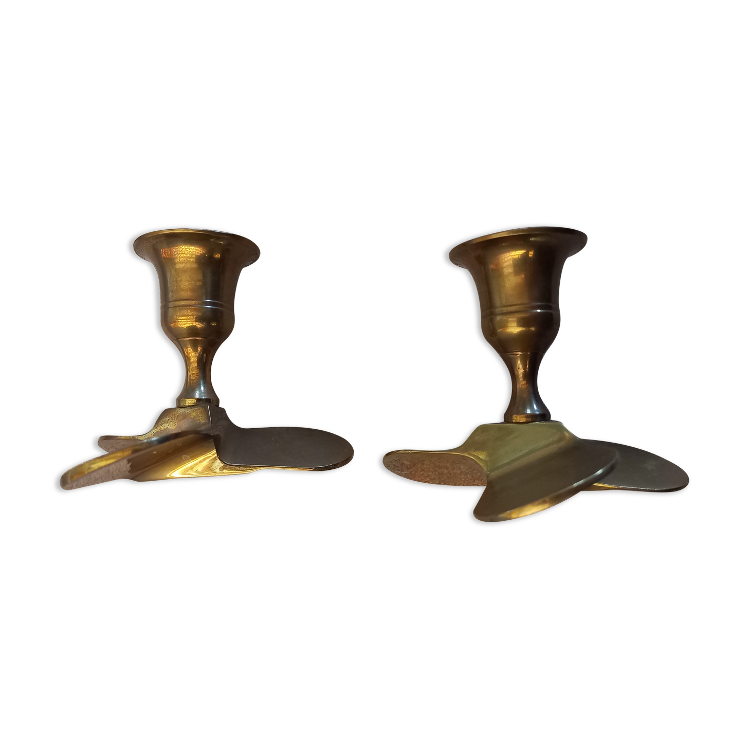 Pair of vintage propeller shape brass candle holders