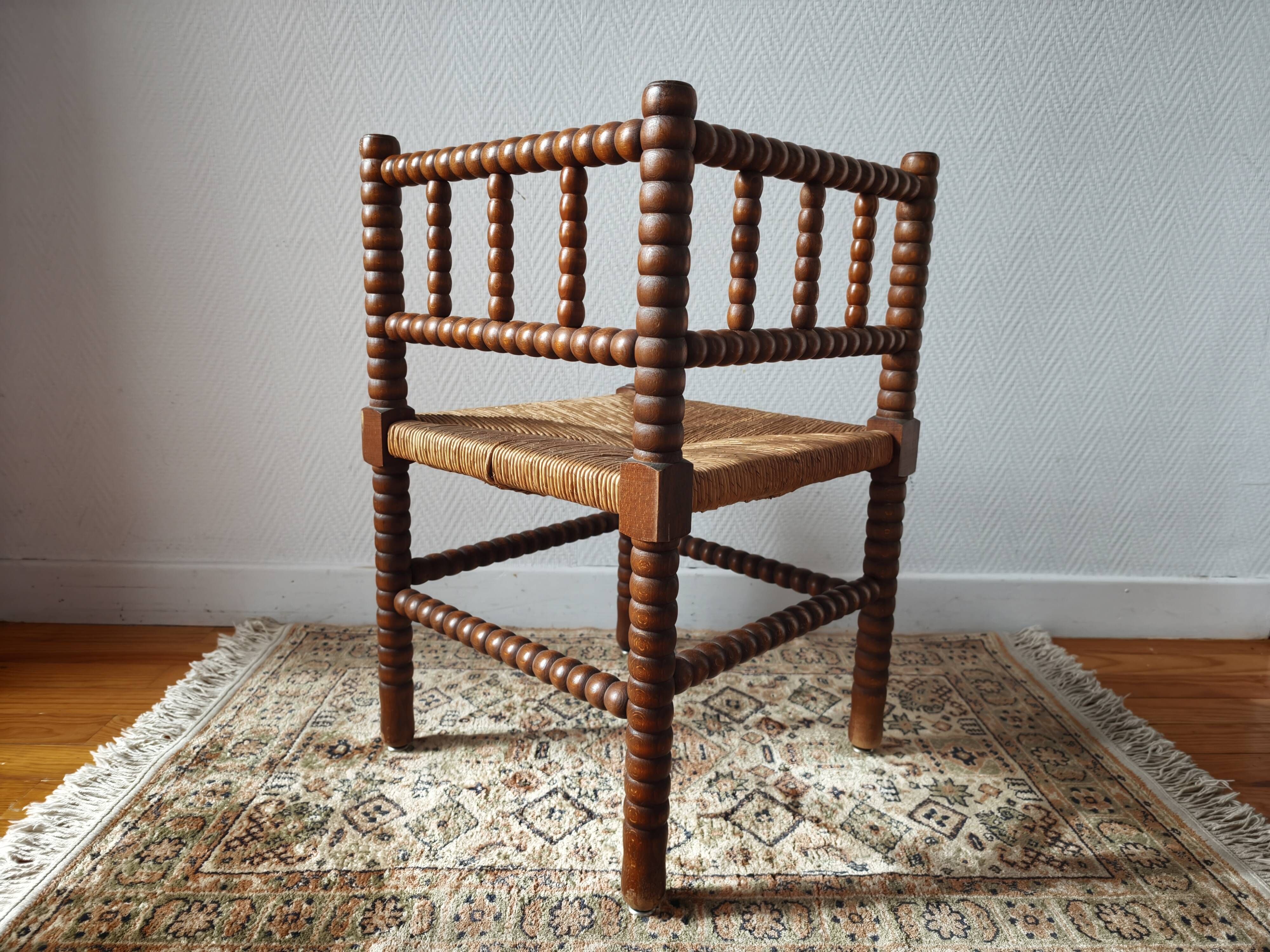 Chaise vintage coin du feu en bois tourné bobine