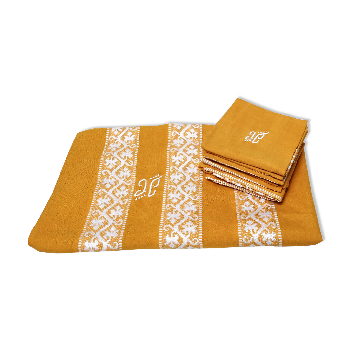 Mustard yellow tablecloth with towels