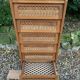 Vintage rattan chest of drawers with splayed legs from the 1950s.