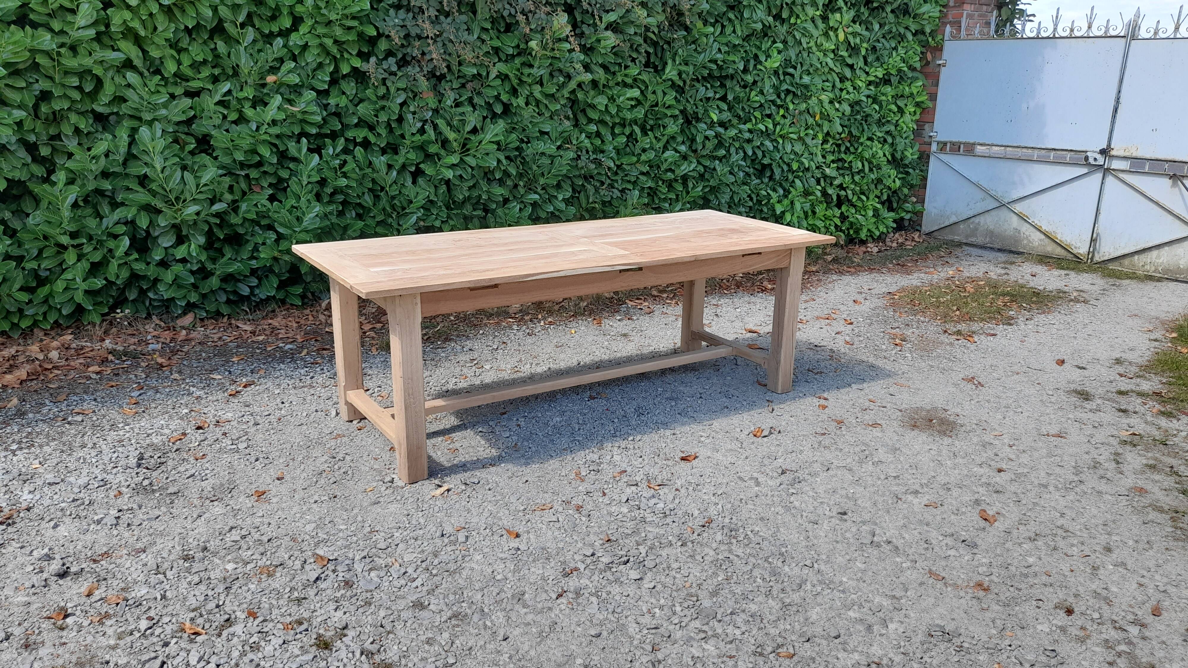 Solid oak farmhouse table in raw wood