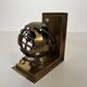 Pair of Brass Bookends with Openwork Globe Decorations. Work
