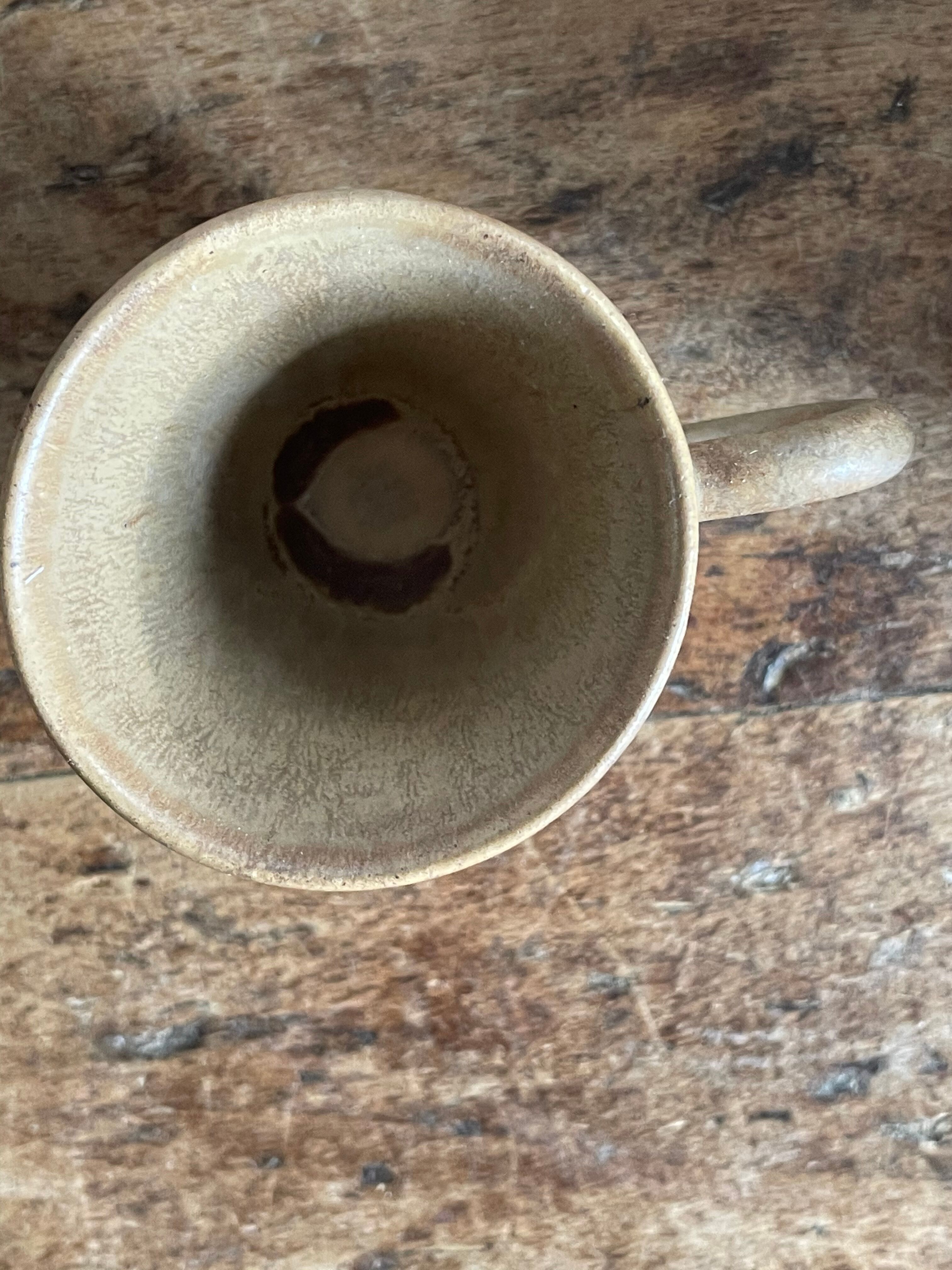 7 very small old sandstone coffee cups