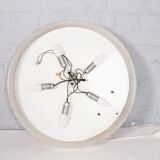 Bright round mirror in plexiglass