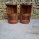 Corner bedside tables, in walnut