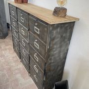 Metal furniture with 15 renovated roneo flaps.