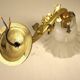 Brass and glass swan neck wall light