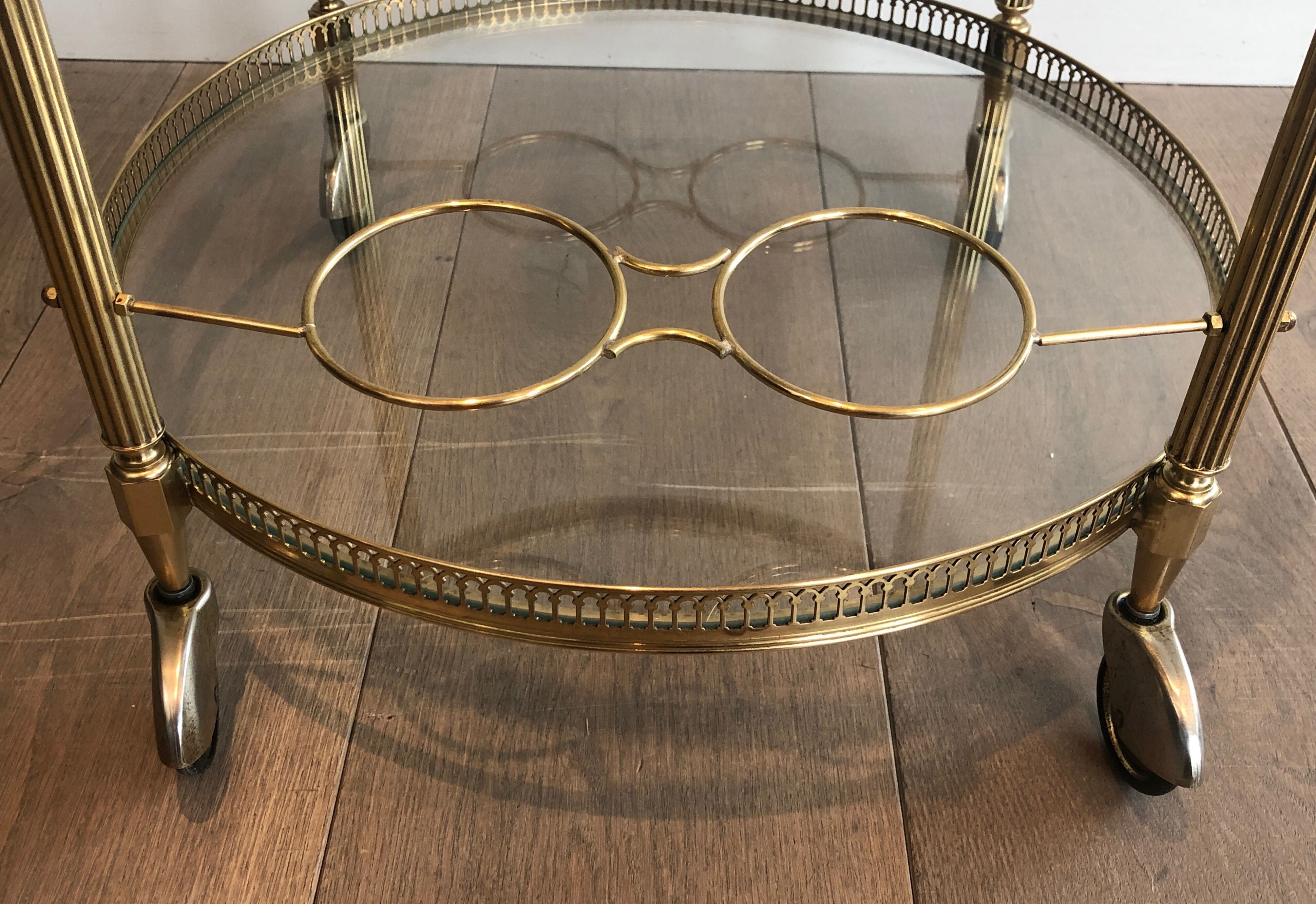 Neoclassical style rolling table in brass