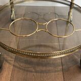 Neoclassical style rolling table in brass