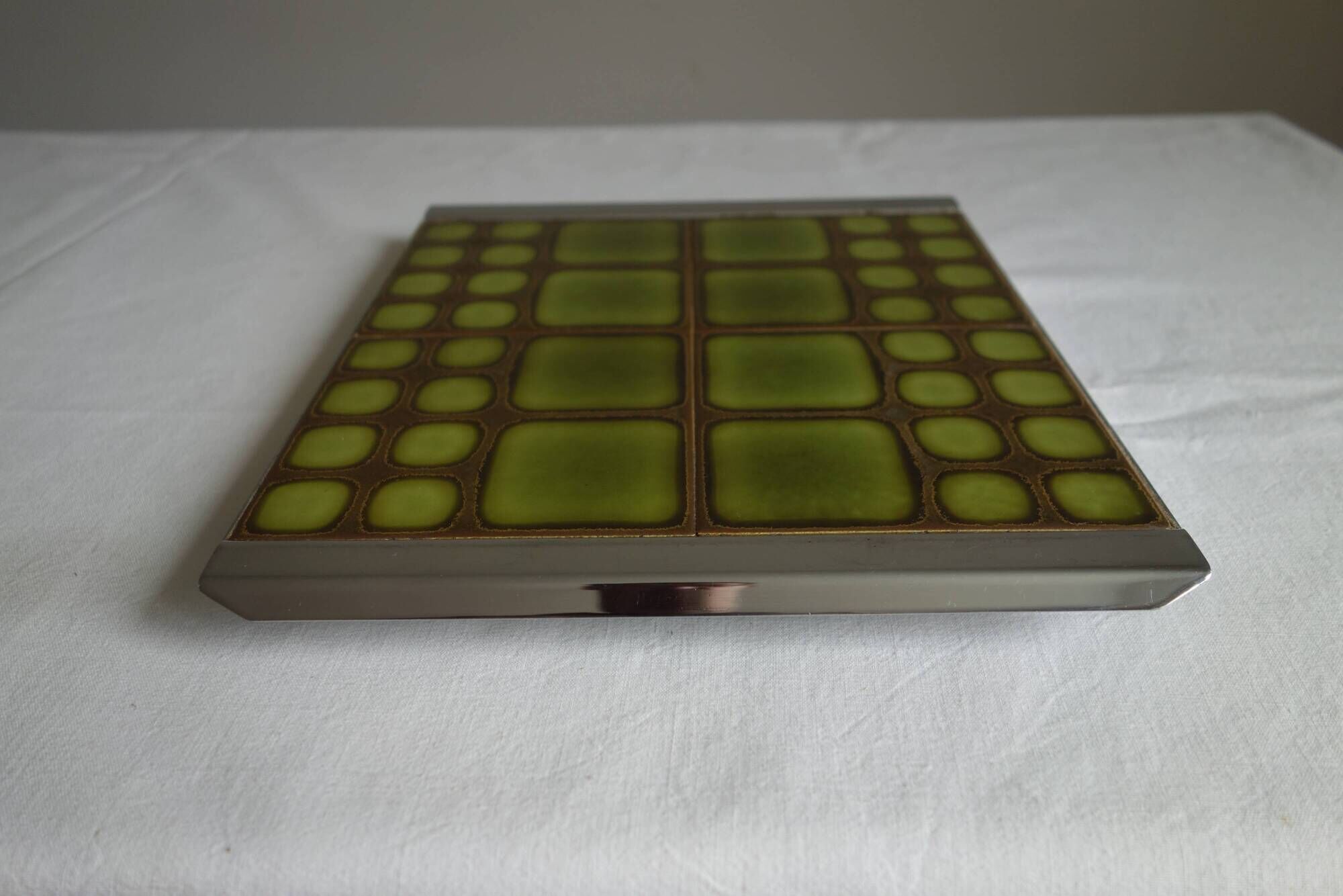 Vintage trivety ceramic and metal tiles