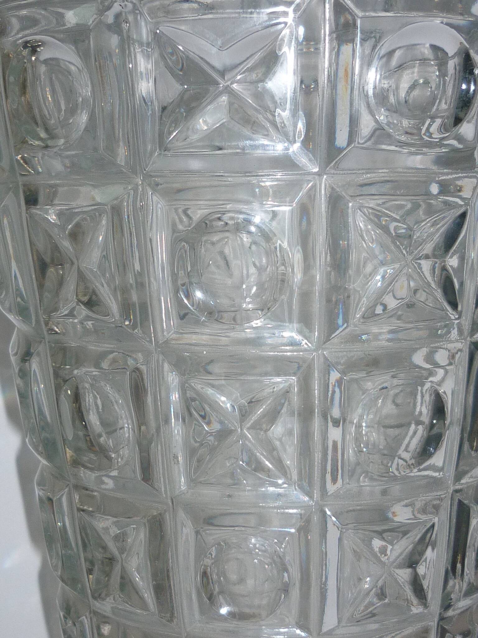 Transparent glass vase with art deco geometric patterns