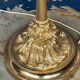 Baroque-style floor lamp in solid gilded bronze decorated with crystal pendants.
