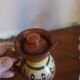 Salt pepper vinegar condiment service in vintage Bulgarian enameled pottery