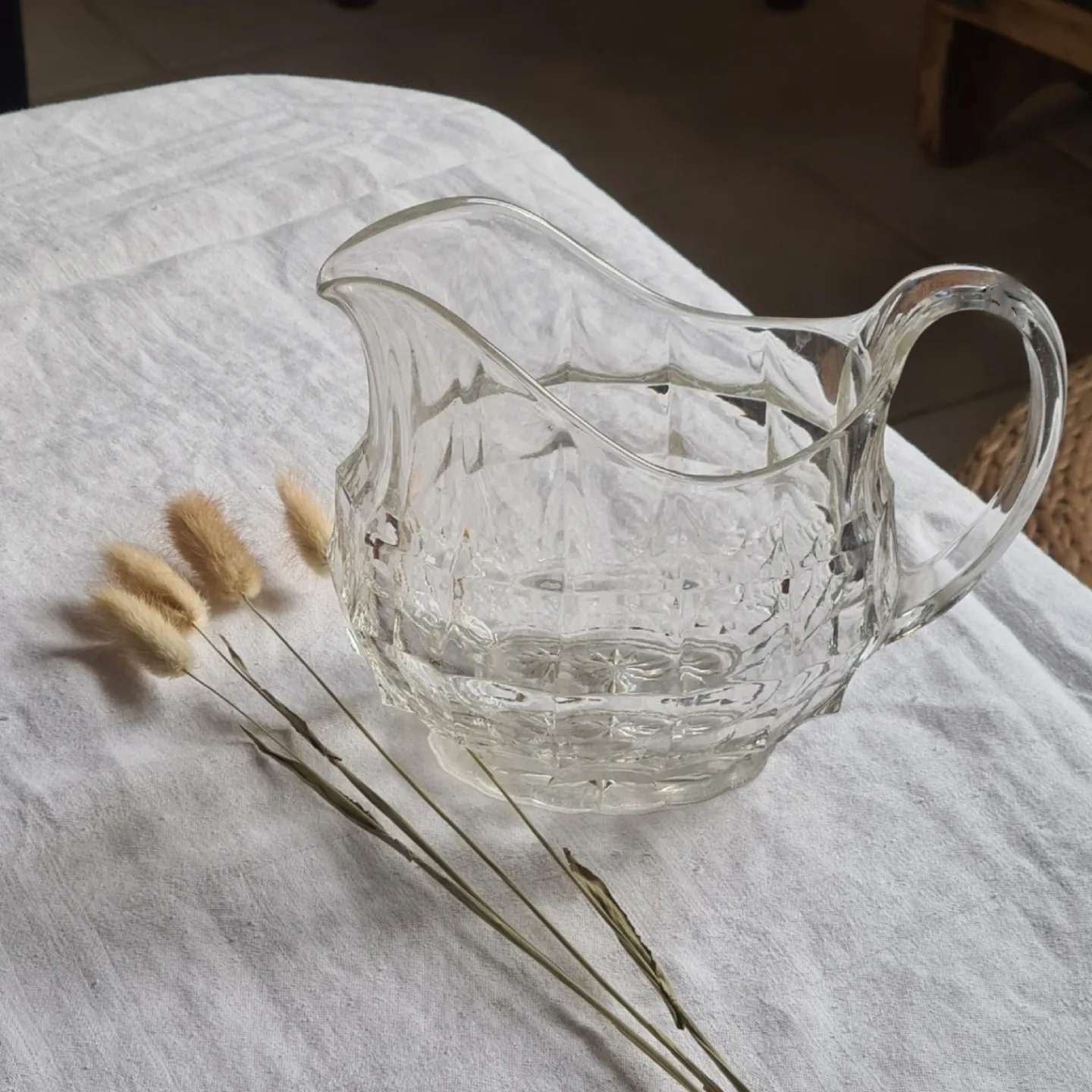 Faceted antique glass pitcher