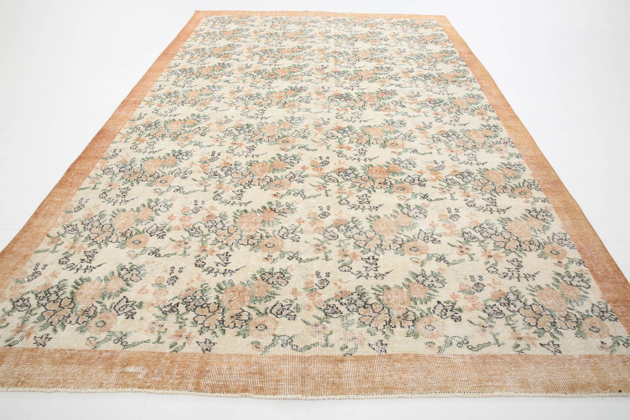 Tapis en laine et coton à décor floral