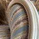Pair of Louis XVI style chairs in painted wood and satin, classic elegance.