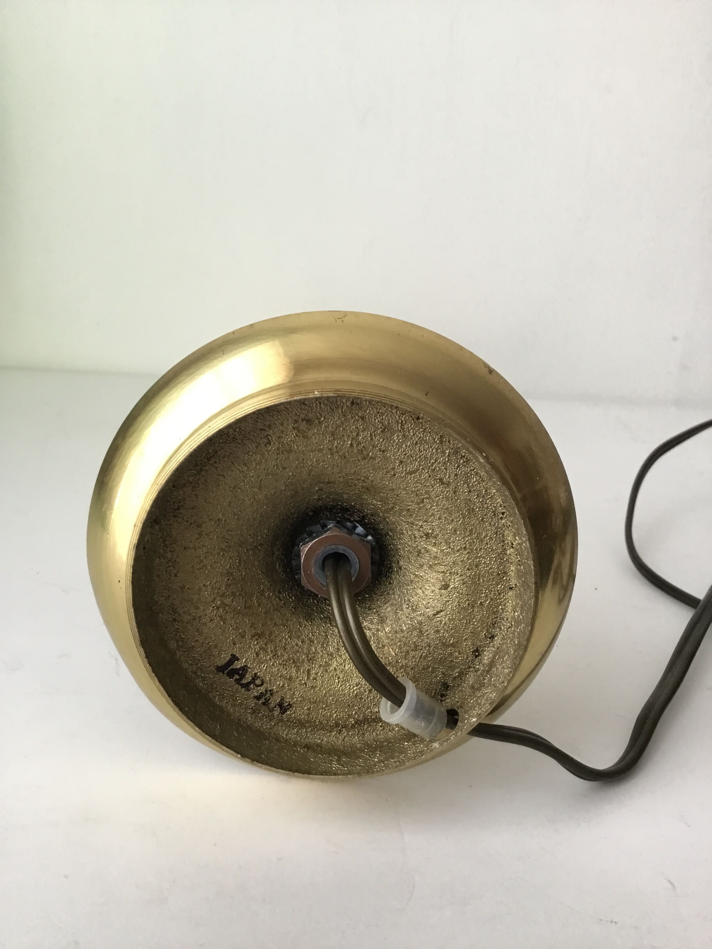 Brass candle-shaped lamp
