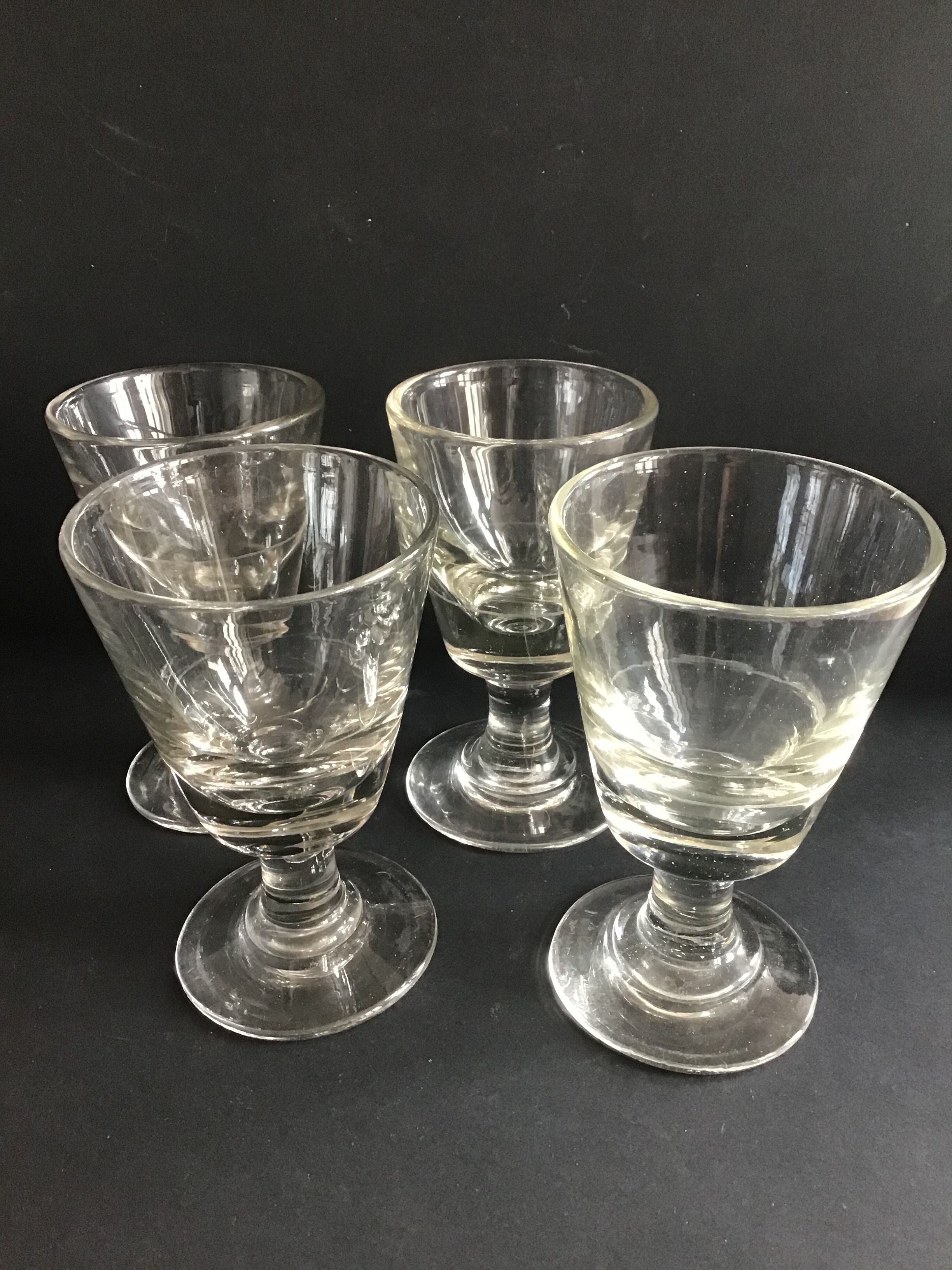 Suite of 4 thick old glasses