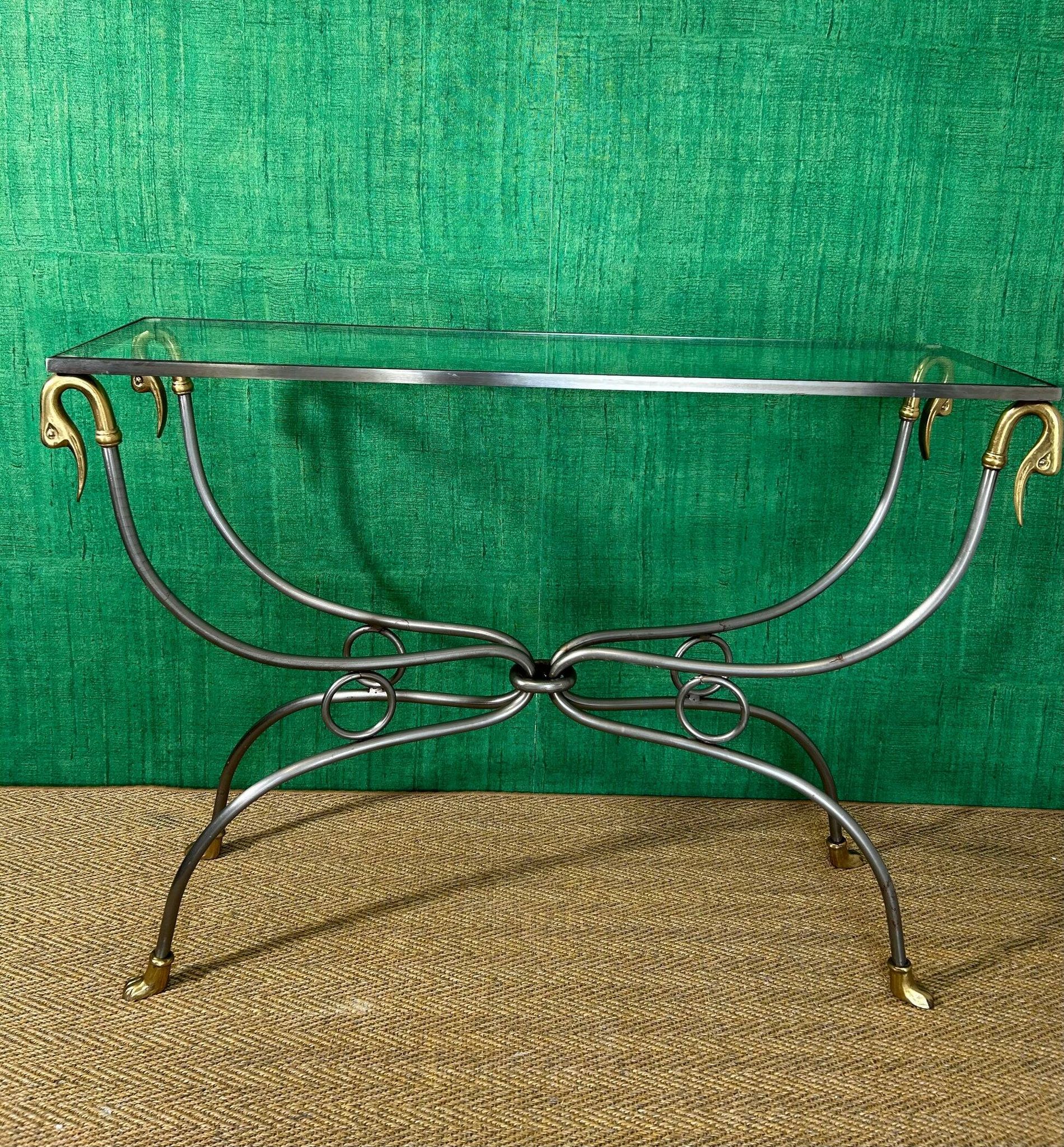 Polished steel and brass console, probably Maison Jansen, France, mid-century modern Hollywood Regency.