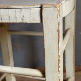 Old patinated painted wooden stool