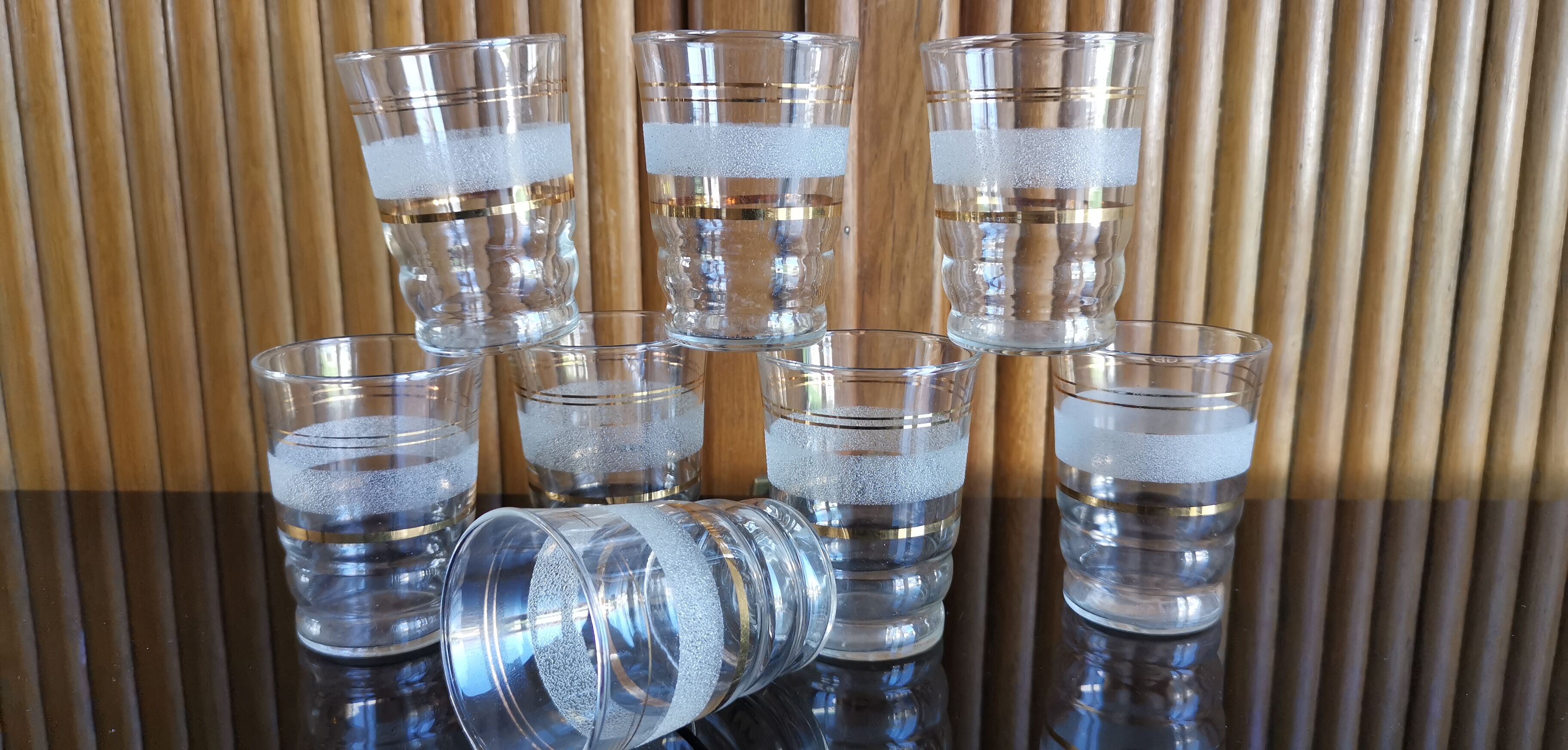8 granite glasses bordered gold 1950s
