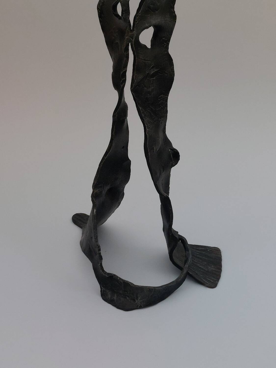 Sculptural brutalist floor candle holder made of hand-forged iron from the 1950s.