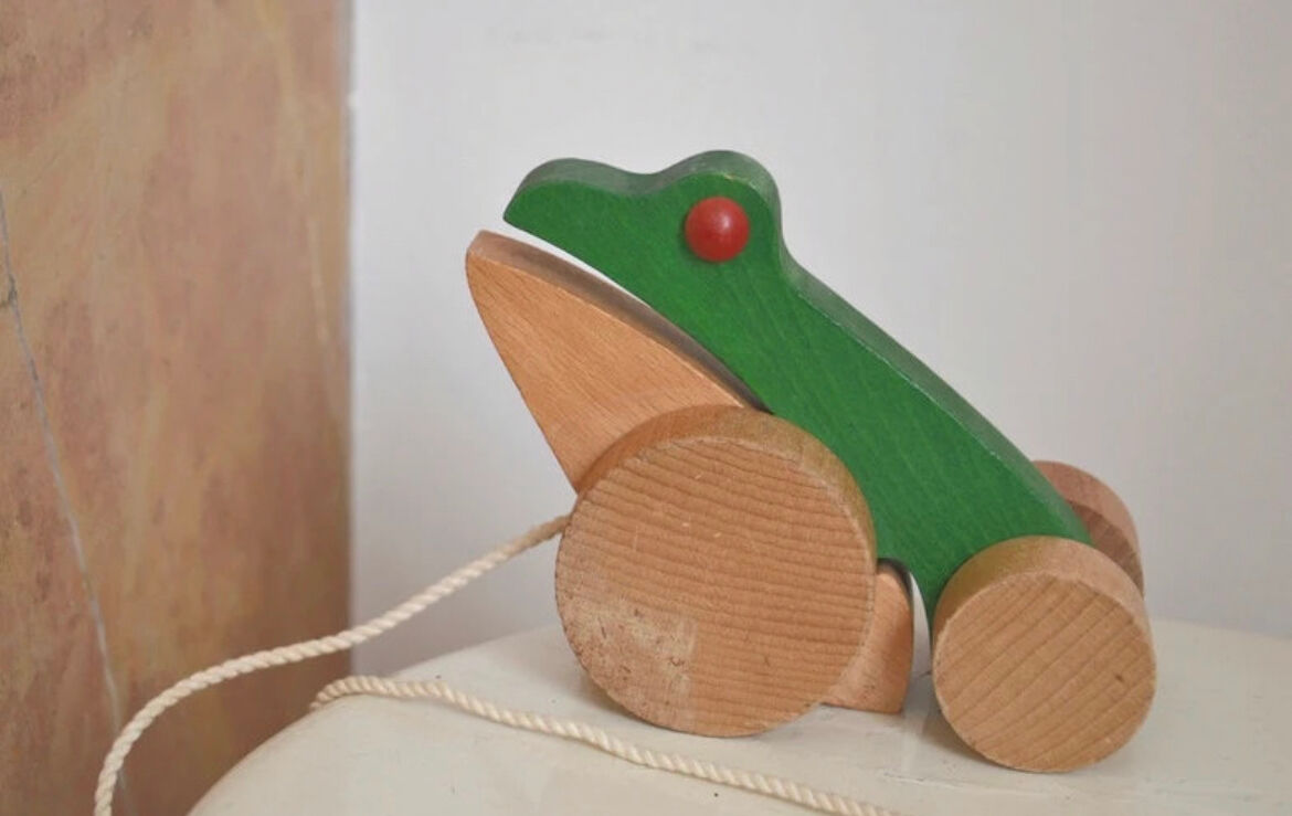 Vintage pulling frog wooden toy