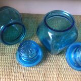 2 blue glass jars